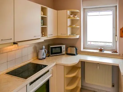Küche / Küchenzeile Ferienappartement Fraenzi - mit herrlichem Meerblick