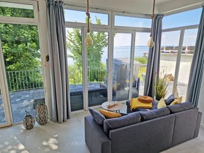 Wohnzimmer Villa Küstenperle - App. Auszeit - Meerblick pur!