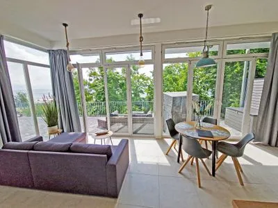 Wohnzimmer Villa Küstenperle, App. Muschelblick - Meerblick pur!