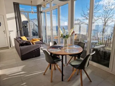 Wohnzimmer Villa Küstenperle, App. Muschelblick - Meerblick pur!