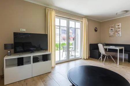 Wohnzimmer Haus Muschelsucher, Birkenstraße 7a, App. 1