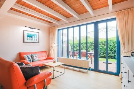 Wohnzimmer Haus Muschelsucher, Dünenstraße 44, App. 2