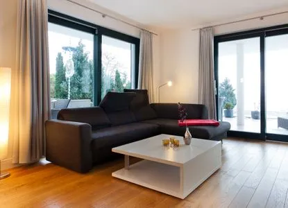 Wohnzimmer Villa Friede-Marie, App. Hannah - mit Terrasse und Ostseeblick