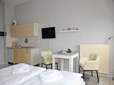 Wohnzimmer Alter Reichshof, App. 305 mit Balkon und Meerblick