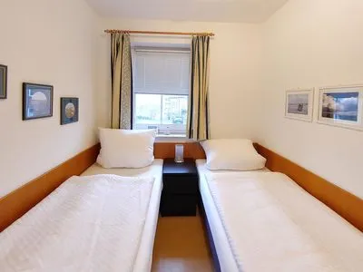 Schlafzimmer in der Ferienwohnung Inselnest am Meer in Wittdün auf Amrum Haus *Südspitze 17* Ferienwohnung *Inselnest am Meer*