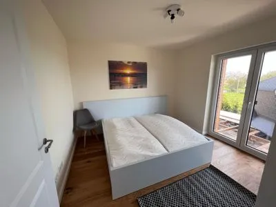 Schlafzimmer Ferienwohnung Frees Mooi