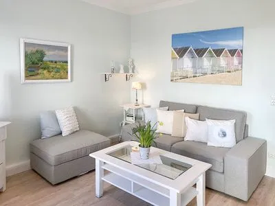 Wohnzimmer Haus Anholt App. 36 - Auszeit zu Zweit mit Strandkorb auf dem Balkon