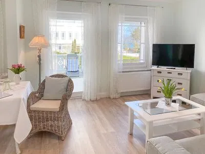 Wohnzimmer Haus Anholt App. 36 - Auszeit zu Zweit mit Strandkorb auf dem Balkon