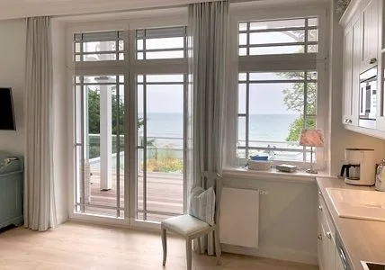 Wohnzimmer Villa Svanen App. 1 - exklusive Ferienwohnung mit Panorama-Meerblick - Deine Ferien am Meer