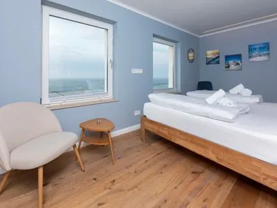 Schlafzimmer Haus Waterkant - in erster Reihe mit traumhaftem Meerblick