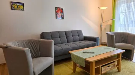 Wohnzimmer Ferienwohnung Feuerstein - in Hafennähe