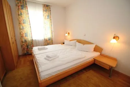 Schlafzimmer Ferienwohnung Feuerstein - in Hafennähe