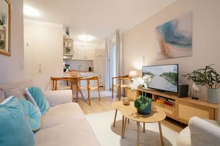 Wohnzimmer (ARW3) Ferienwohnung Cozy Harbour