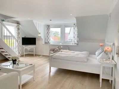 Wohnzimmer Haus Midsommer App. 14 - zentral & strandnah mit 2 Schlafzimmern auf zwei Etagen