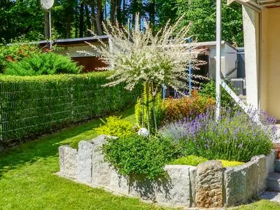 Ferienhaus Waterkieker am Jabelschen See - Garten mit Seeblick  Waterkieker