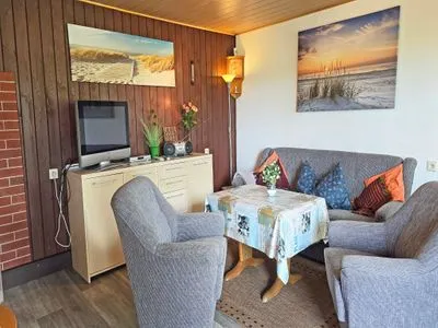 Wohnzimmer Ferienhaus am Wiesengrund auf Rügen- familienfreundlich mit Terrasse und Grill