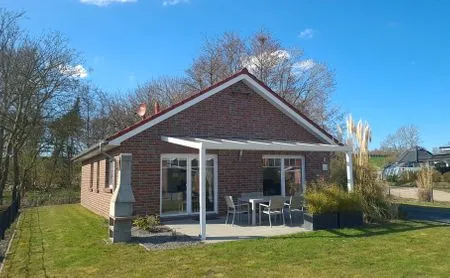 Außenansicht eines Ferienhauses mit Garten Ferienhaus  Deichoase