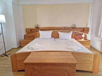Bett Ferienwohnung Ostseeheim - 1. Reihe mit Meerblick