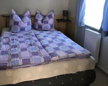 Schlafzimmer Ferienhaus Karger in Sagard auf Rügen mit Terrasse und Garten