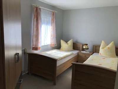 Schlafzimmer Ferienhaus Karger in Sagard auf Rügen mit Terrasse und Garten