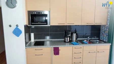 Küche / Küchenzeile Holiday Residenz I Ferienwohnung Inselheimat B42