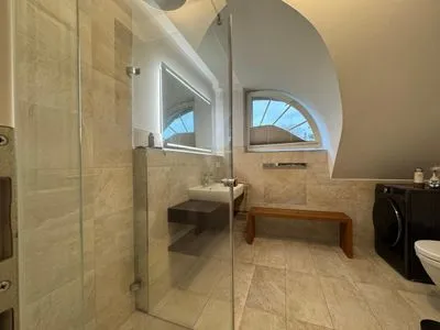 Badezimmer mit ebenerdiger Dusche  Meerzeit