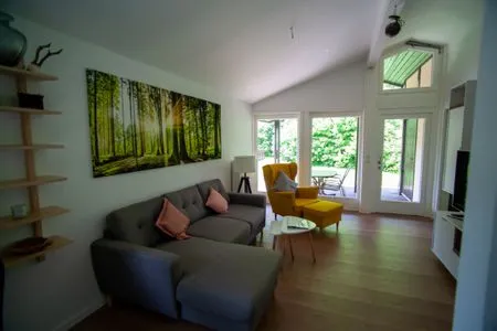 Wohnzimmer Ferienhaus Blätterdach
