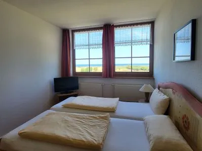 Schlafzimmer Pension Schmelzer Wohnung 2