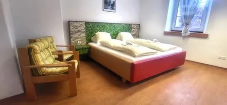 Schlafzimmer 1, Doppelbett und 2 Einzelbetten Hoamathaus II by Alpenidyll Apartments