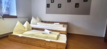 Schlafzimmer Hoamathaus II by Alpenidyll Apartments