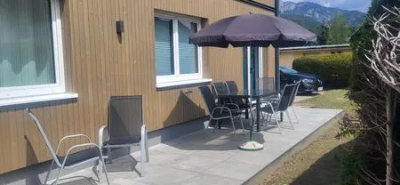 Outdoor area with seating Lasserhäusl by Alpenidyll Apartments