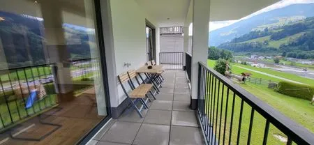 Balcony with a view of the mountains Fischbacher App. 1 by Alpenidyll Apartments