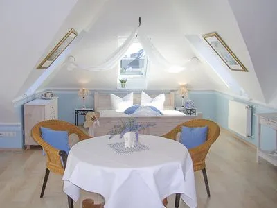 Wohnzimmer Haus Anholt App. 39 - großzügige Studiowohnung in der Strandallee mit Teilmeerblick