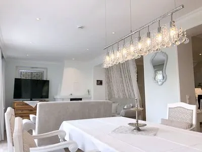 Wohnzimmer Unser Sommerhaus - Ferienhaus mit Garten, Balkonen & Sonnenterrasse