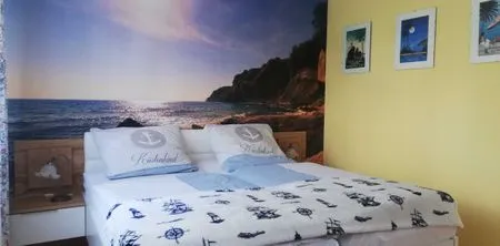 Schlafzimmer Ferienwohnung Kapitänsmesse -  traumhafter Ausblick über Hafen und Meer