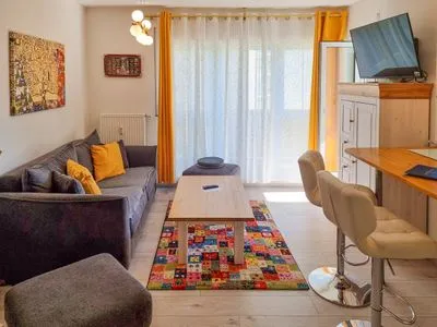 Wohnzimmer Ferienwohnung Sonnenblick - zentral in der Hafenstadt Sassnitz