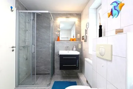 Badezimmer mit ebenerdiger Dusche  Rosenberg-Siedlung 21