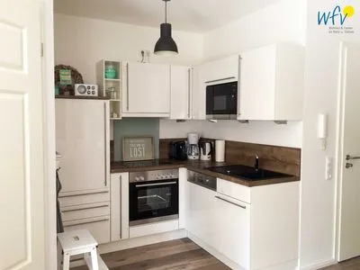 Küche / Küchenzeile Ferienhaus Melkerpad 28 Ferienwohnung Langeoogzeit