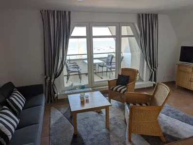 Wohnzimmer Fewo "An de Waterkant" - Leuchtturmblick, Balkon
