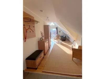 Flur mit Blick zum Wohnzimmer  Ferienwohnung Seepferdchen