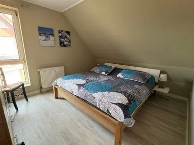 Schlafzimmer mit Doppelbett  Ferienwohnung Seepferdchen