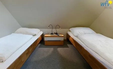 Schlafzimmer Kleine Pinkenburg Ferienwohnung Nord und Süd