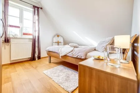 Schlafzimmer mit Einzelbett  Haus Leni