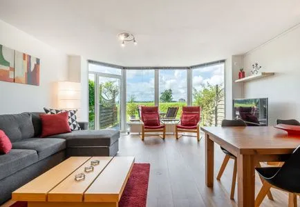 Wohnzimmer Ferienwohnung Schleiwiese mit Meerblick in Stexwig