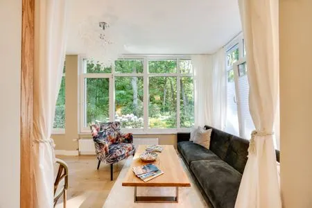 Wohnzimmer Wald & Meer Apartments, FeWo II: Waldblick