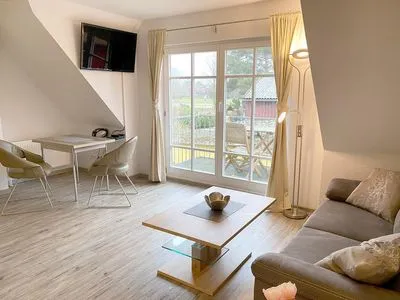 gemütlicher und modern eingerichteter Wohnbereich mit Balkon Heckenrose W5