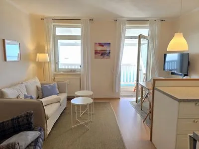 Wohnzimmer Fürstenhof, App. 403 - erste Reihe am Meer