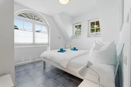 Schlafzimmer mit Doppelbett  de Obendtied - Wohnung 4