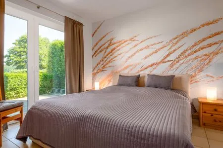 Schlafzimmer Ferienwohnung Krebssee Idyll 1