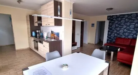 Wohnzimmer Ferienwohnung Ostrea Breege - mit Garten und Grill